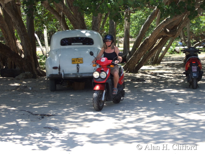 Margaret on a motor scooter