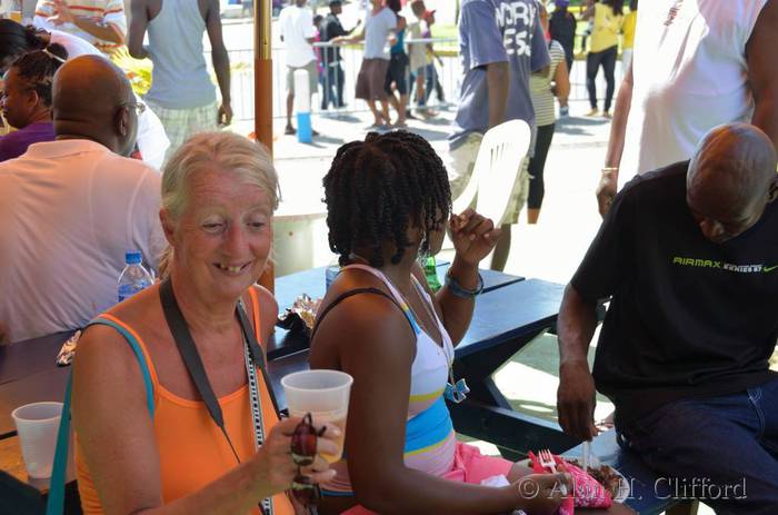 Margaret has a beer at the carnival